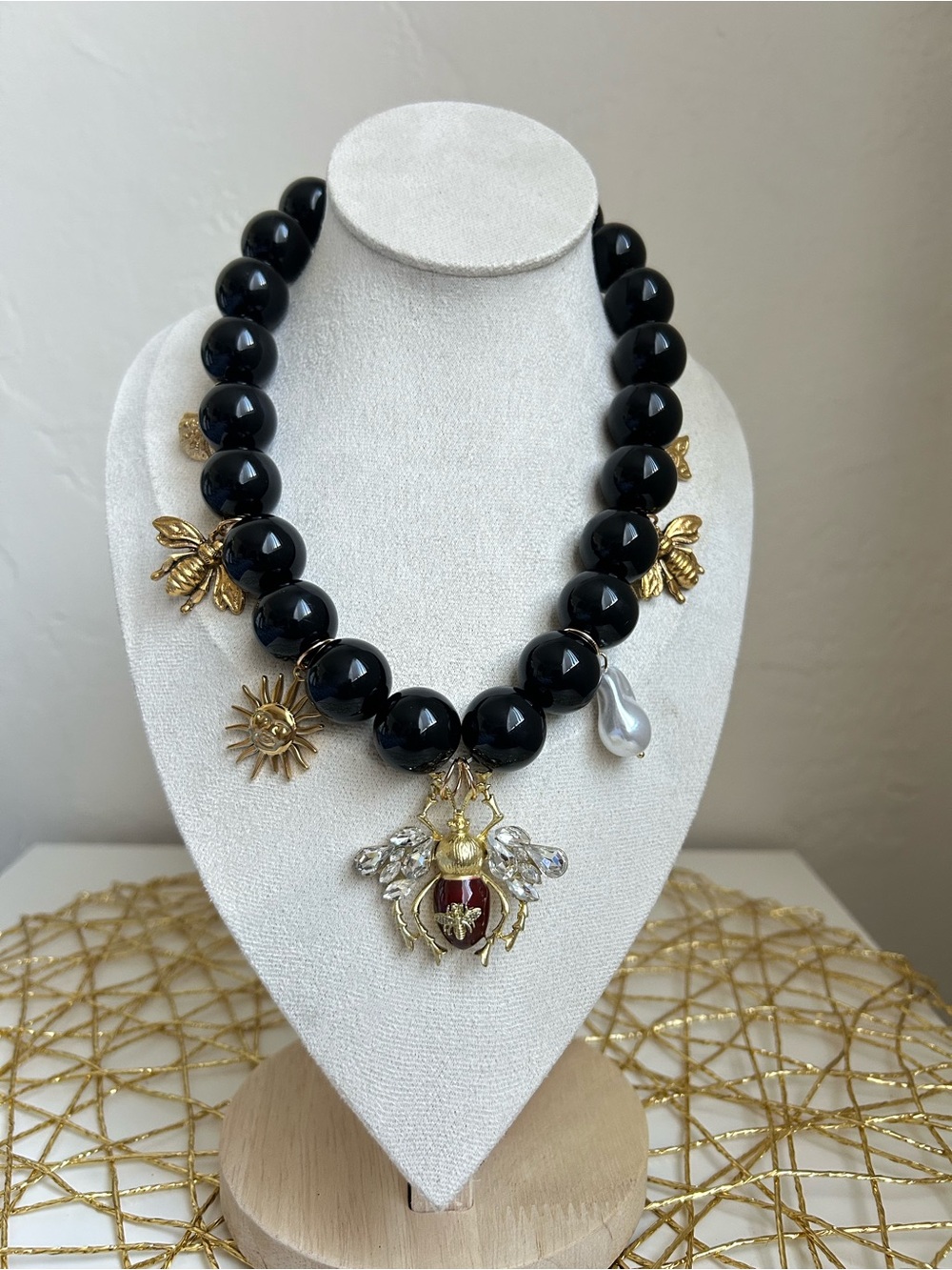 Statement Black Bead Necklace with Gold Bee & Sun Charms